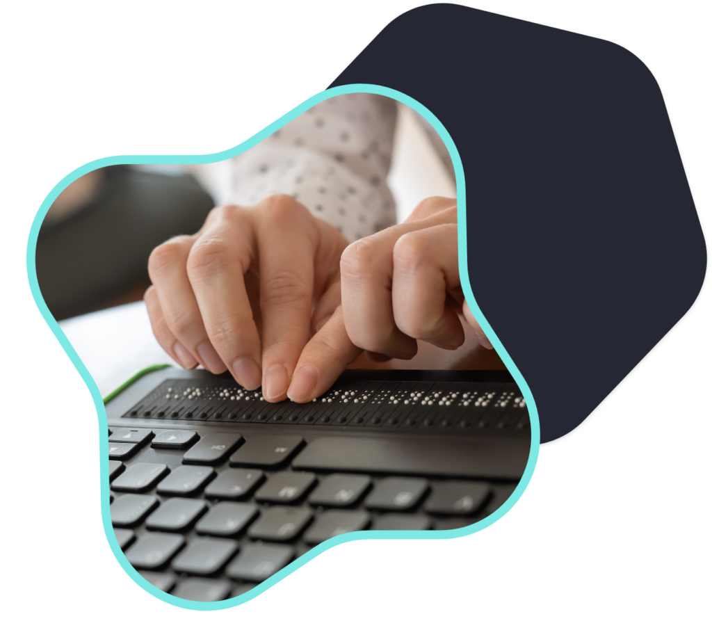 A person using a Braille reader