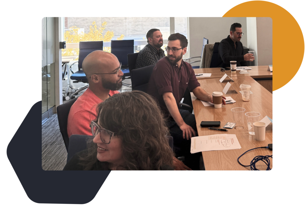 Some of the Mile6 team in discussions during an exercise during a team building workshop.